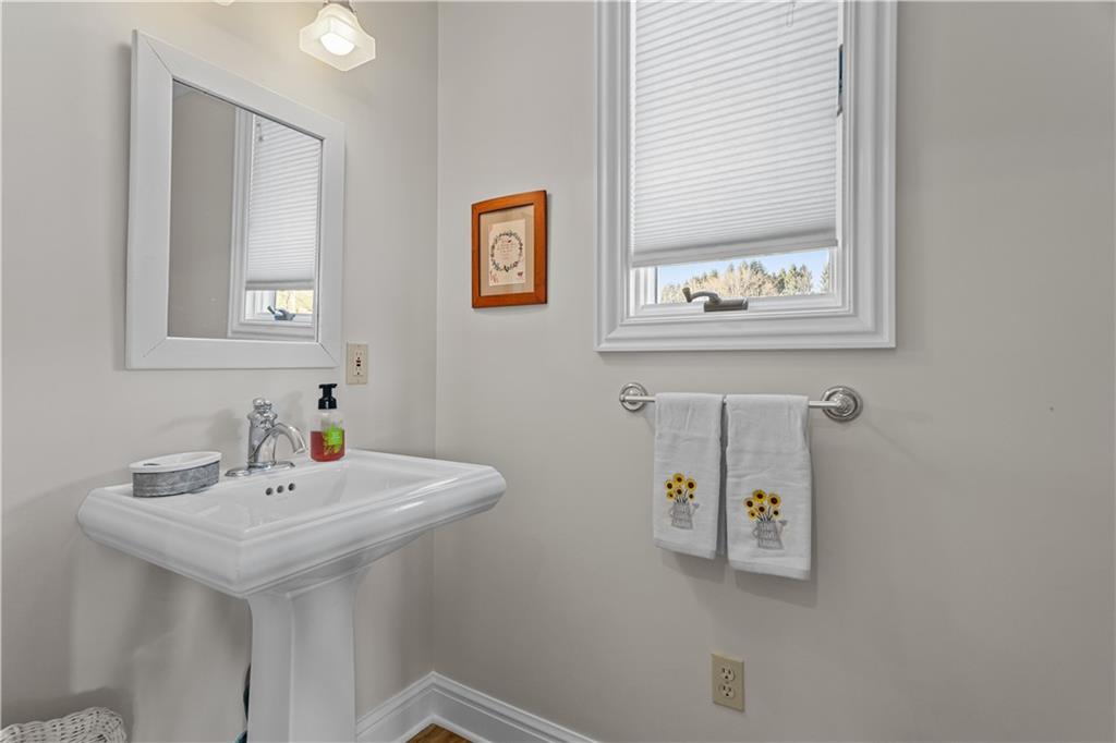 300 McCombs Road Venetia, PA 15367 - Photo 12 of 25 a bathroom with a sink and a mirror
