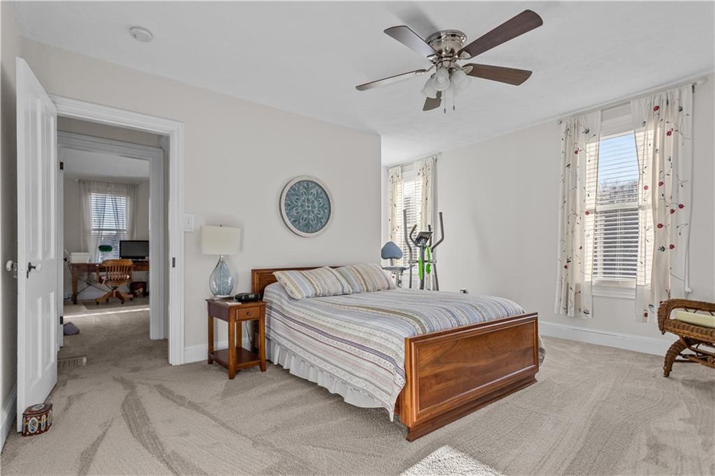 300 McCombs Road Venetia, PA 15367 - Photo 19 of 25 a bedroom with a bed and a chandelier