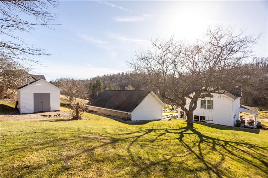 300 McCombs Road Venetia, PA 15367 - Photo 4 of 25 a view of a house with pool and sitting area