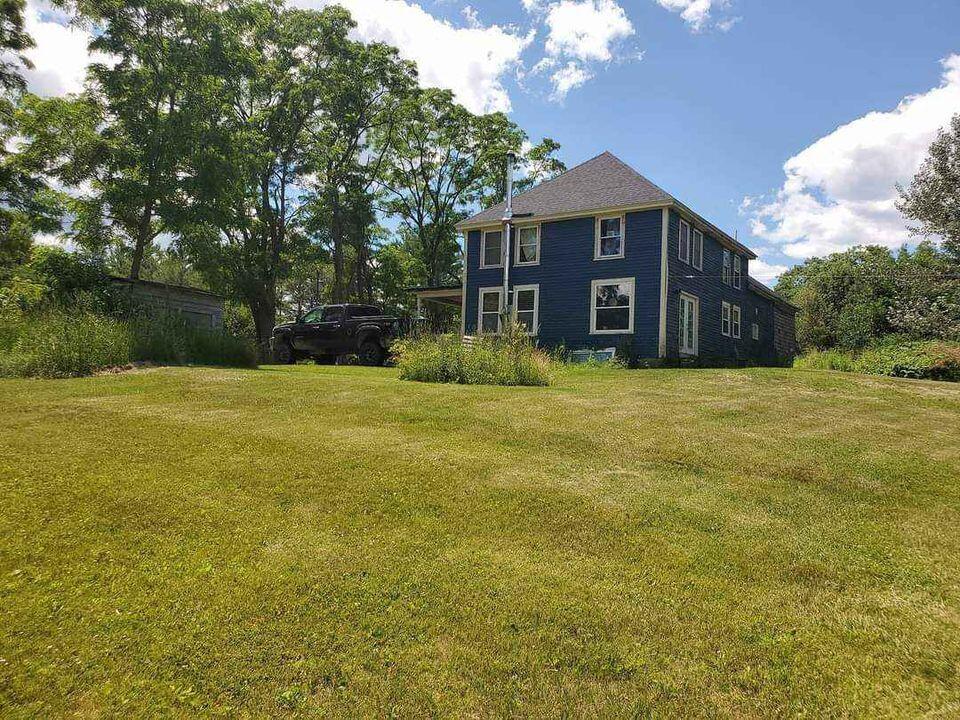 153 Strickland Loop Road Livermore Falls, ME 04254 - Photo 2 of 18 side view