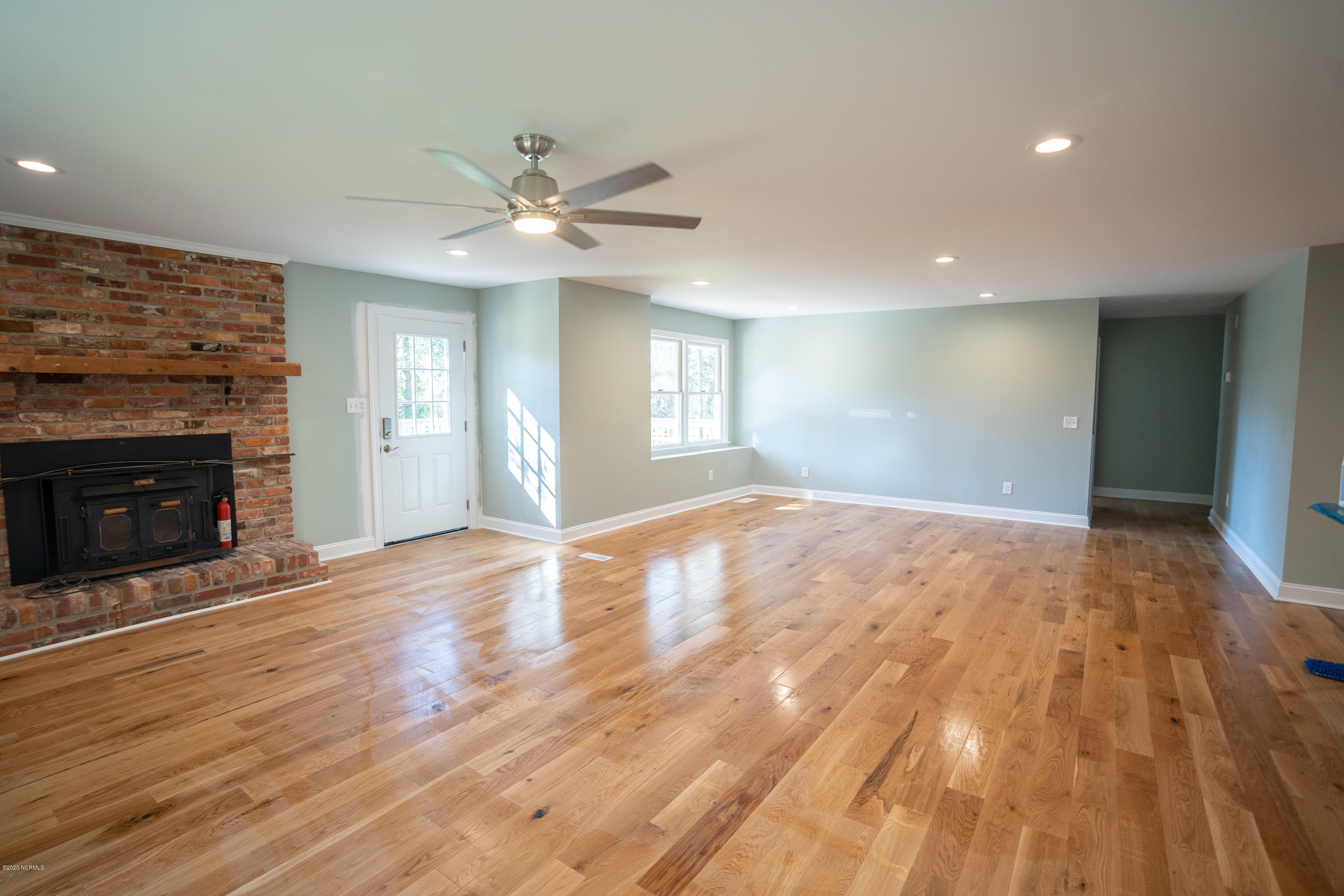 6309 Myrtle Grove Road Wilmington, NC 28409 - Photo 20 of 39 living area fireplace