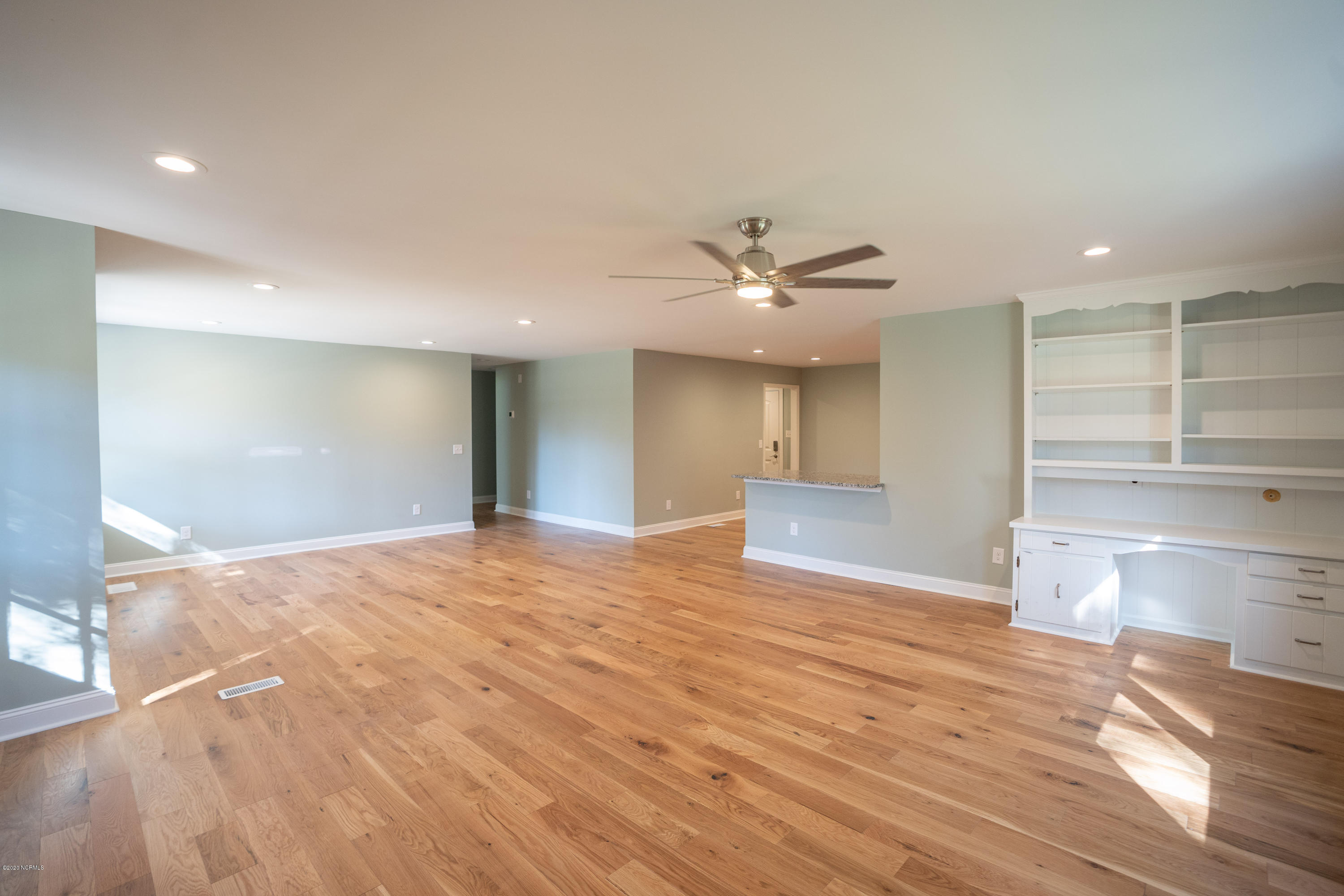 6309 Myrtle Grove Road Wilmington, NC 28409 - Photo 21 of 39 living area bookcase