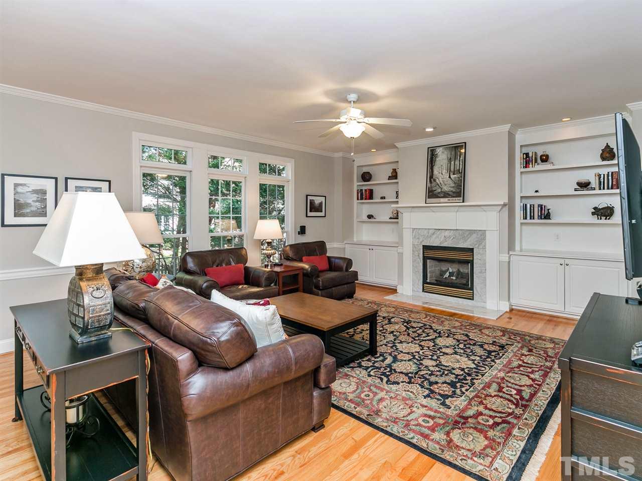 2401 Narrawood Street Raleigh, NC 27614 - Photo 3 of 25 Built-in Bookcases and Gas Fireplace in the Family Room