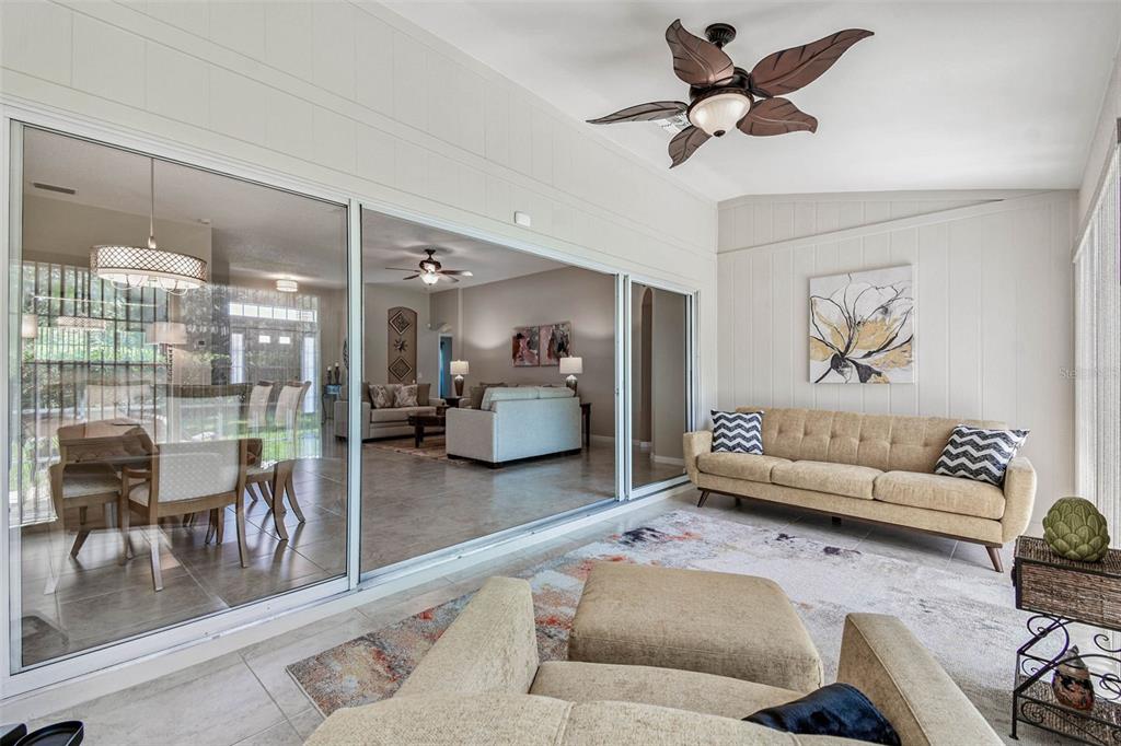 12202 Aaron Terrace Trinity, FL 34655 - Photo 9 of 41 a living room with furniture and a large window