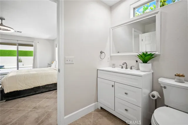 a bathroom with a sink toilet and tub