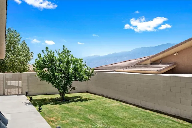 a view of balcony with tree