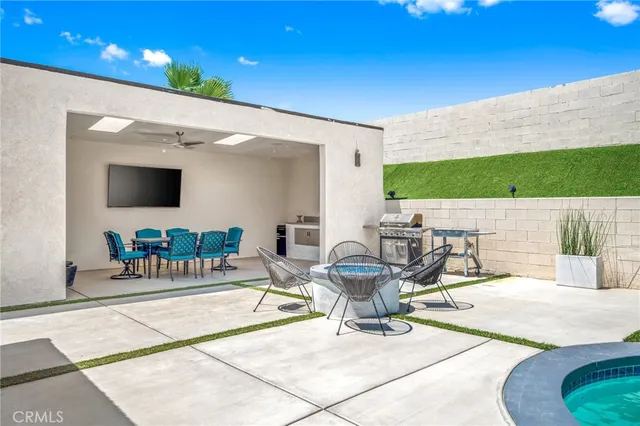 a outdoor space with lots of tables and chairs