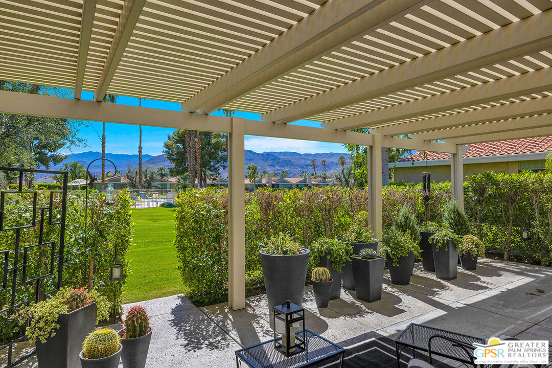 72355 Rodeo Way Rancho Mirage, CA 92270 - Photo 12 of 43 a building outdoor space with patio furniture and potted plants