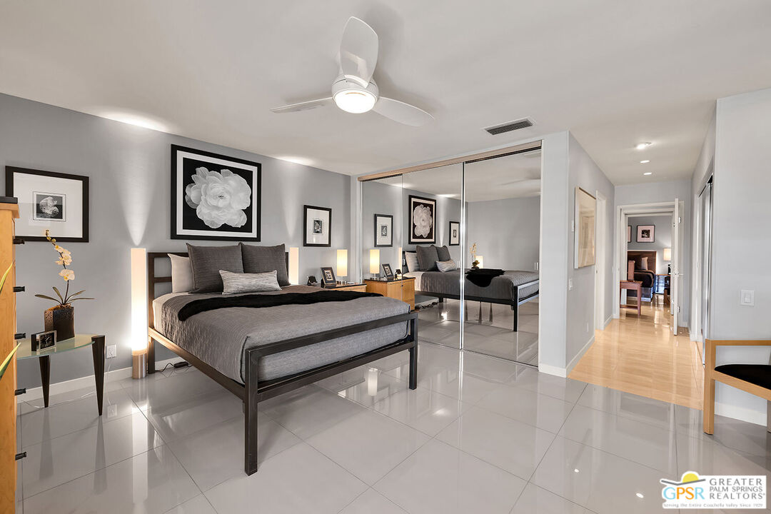 72355 Rodeo Way Rancho Mirage, CA 92270 - Photo 20 of 43 a bedroom with furniture and a table