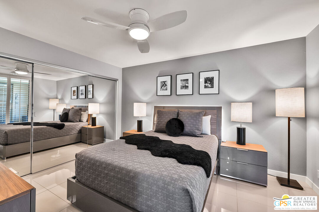 72355 Rodeo Way Rancho Mirage, CA 92270 - Photo 25 of 43 a bedroom with a large bed and a couch