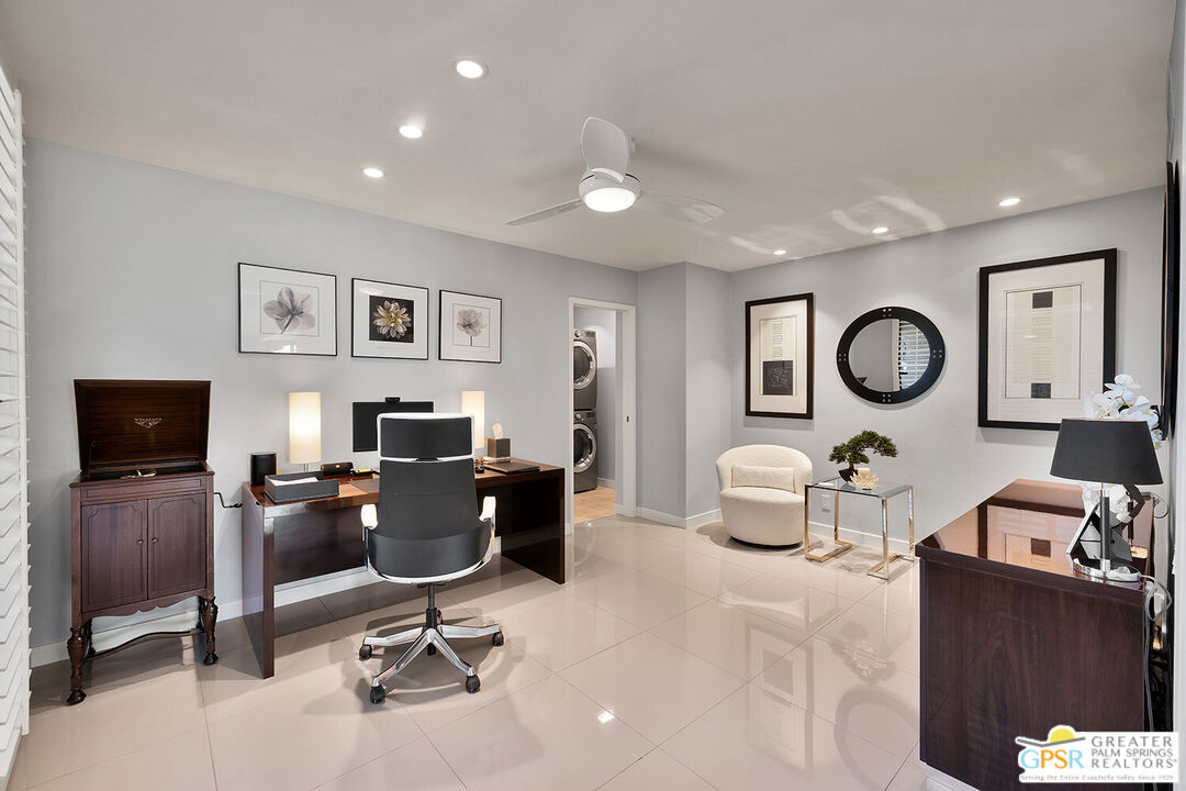 72355 Rodeo Way Rancho Mirage, CA 92270 - Photo 28 of 43 a view of a livingroom with furniture and a flat screen tv