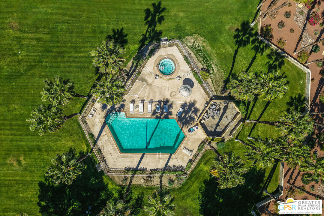 72355 Rodeo Way Rancho Mirage, CA 92270 - Photo 39 of 43 a view of swimming pool with a garden and plants