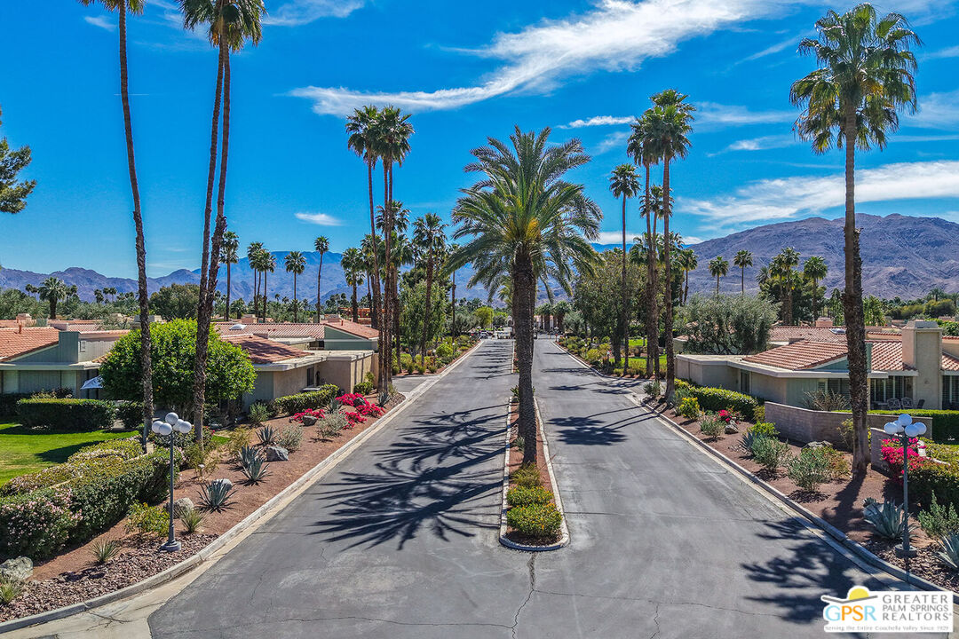 72355 Rodeo Way Rancho Mirage, CA 92270 - Photo 42 of 43 a view of a patio with a table and chairs