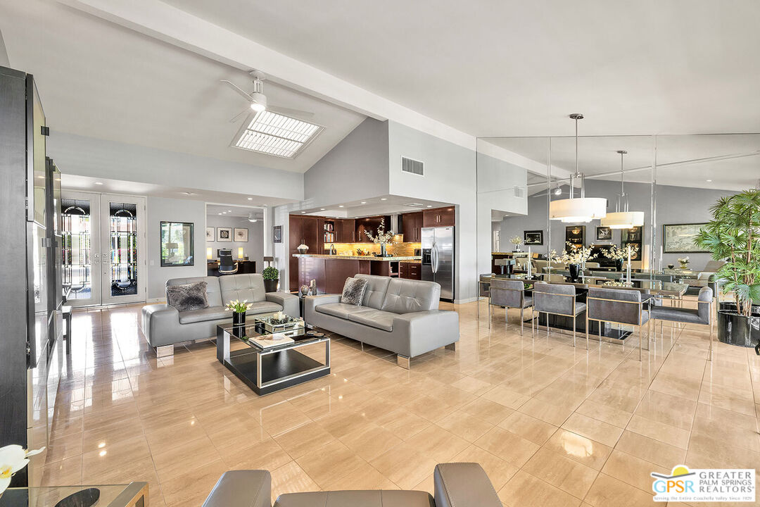 72355 Rodeo Way Rancho Mirage, CA 92270 - Photo 5 of 43 a living room with furniture and a table