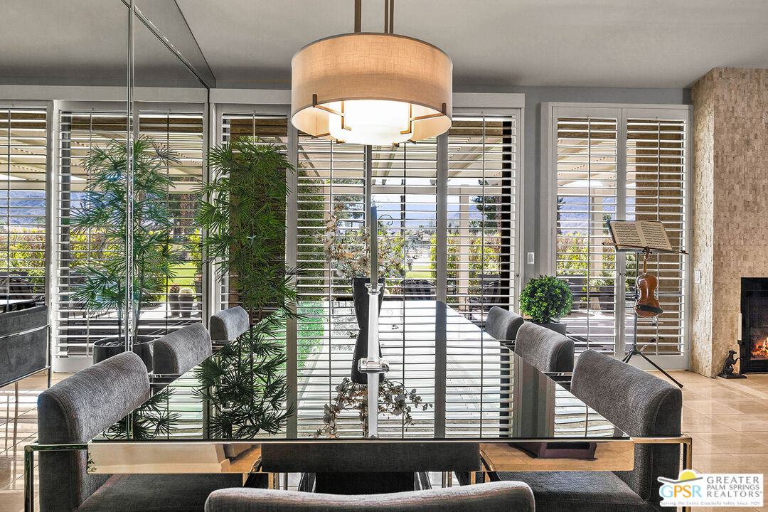 72355 Rodeo Way Rancho Mirage, CA 92270 - Photo 9 of 43 a living room filled with furniture and a large window