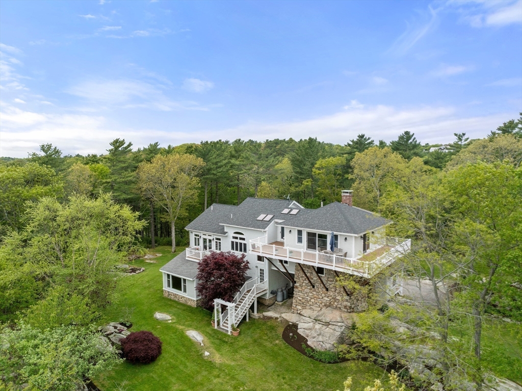 602 Summer Street Manchester, MA 01944 - Photo 29 of 34 an aerial view of a house with yard swimming pool and mountain view in back