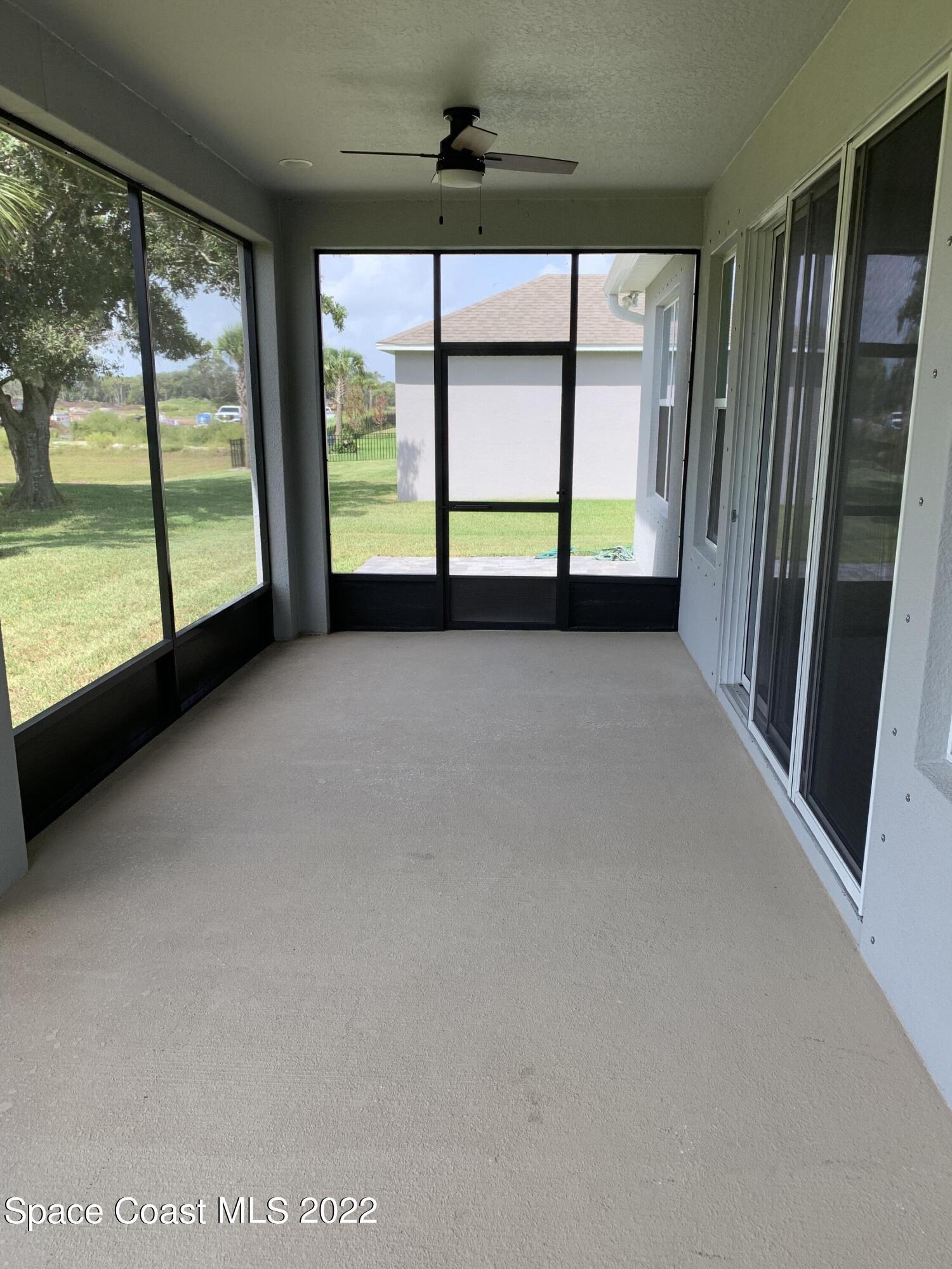 1893 Killian Drive Palm Bay, FL 32905 - Photo 22 of 25 a view of room with a large window