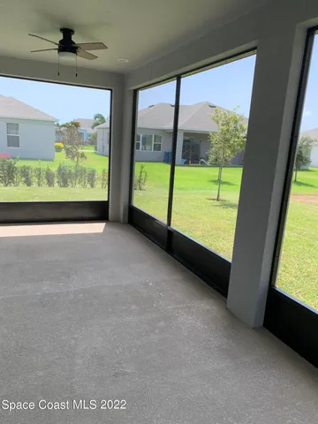a view of backyard with green space