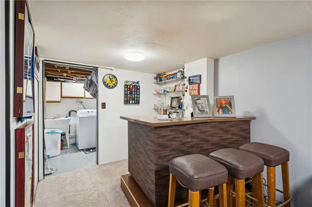 a view of dining room filled with furniture and wooden floor