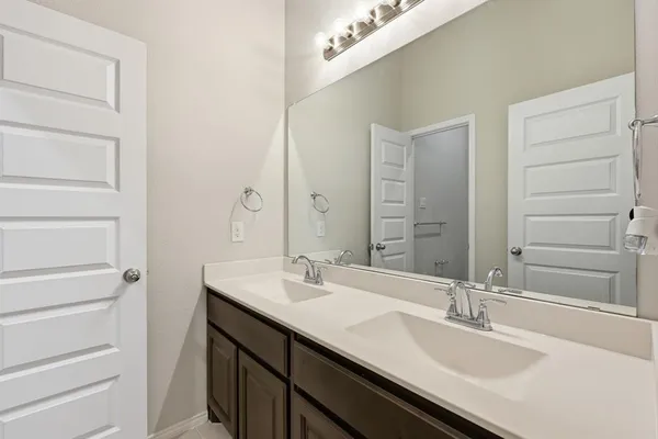 an empty room with closet area