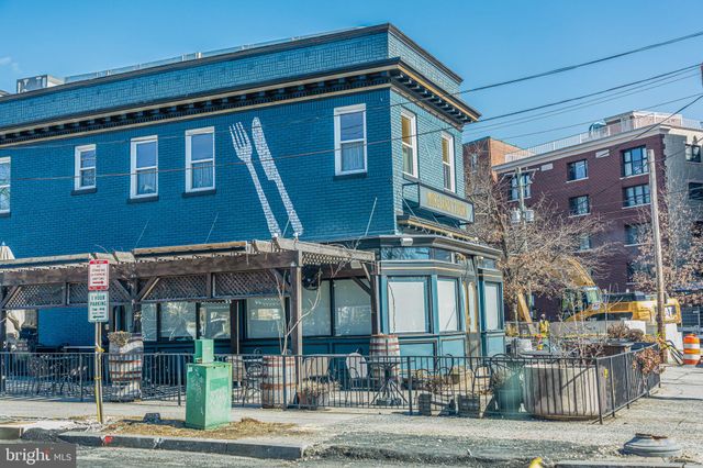 a view of a city street from a balcony