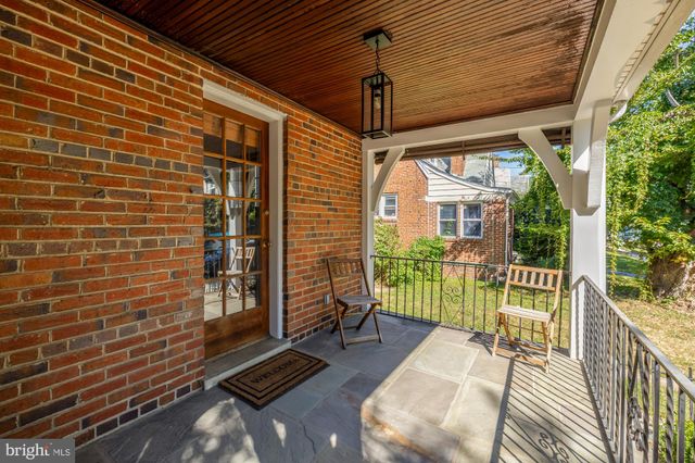 a view of balcony with wooden floor