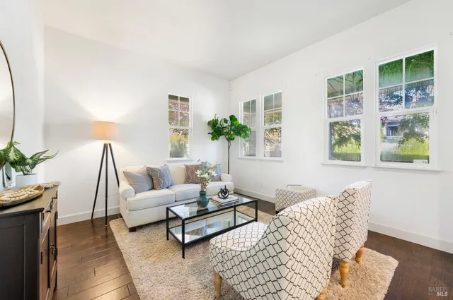 a bedroom with a bed and a table