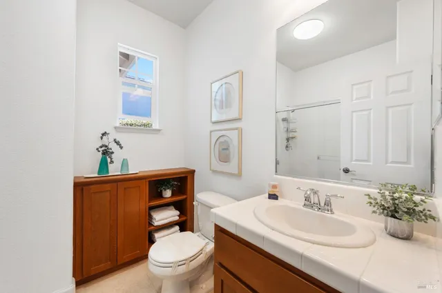a kitchen with a sink stove and refrigerator