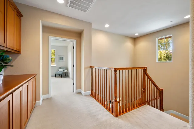 a spacious bathroom with a toilet a sink and a bathtub