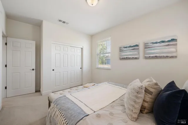an aerial view of a city with lots of residential buildings