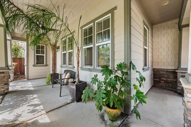 a view of a livingroom with furniture and wooden floor