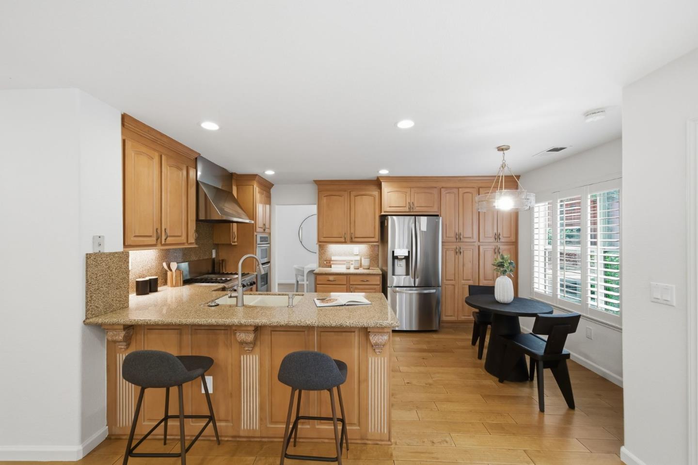 375 Montevideo Circle Fremont, CA 94539 - Photo 13 of 45 a dining room with furniture and a large window