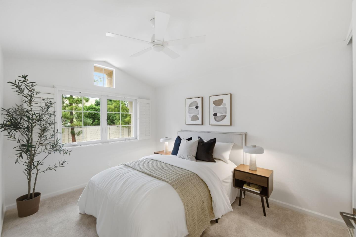 375 Montevideo Circle Fremont, CA 94539 - Photo 29 of 45 a bedroom with a large bed and a potted plant