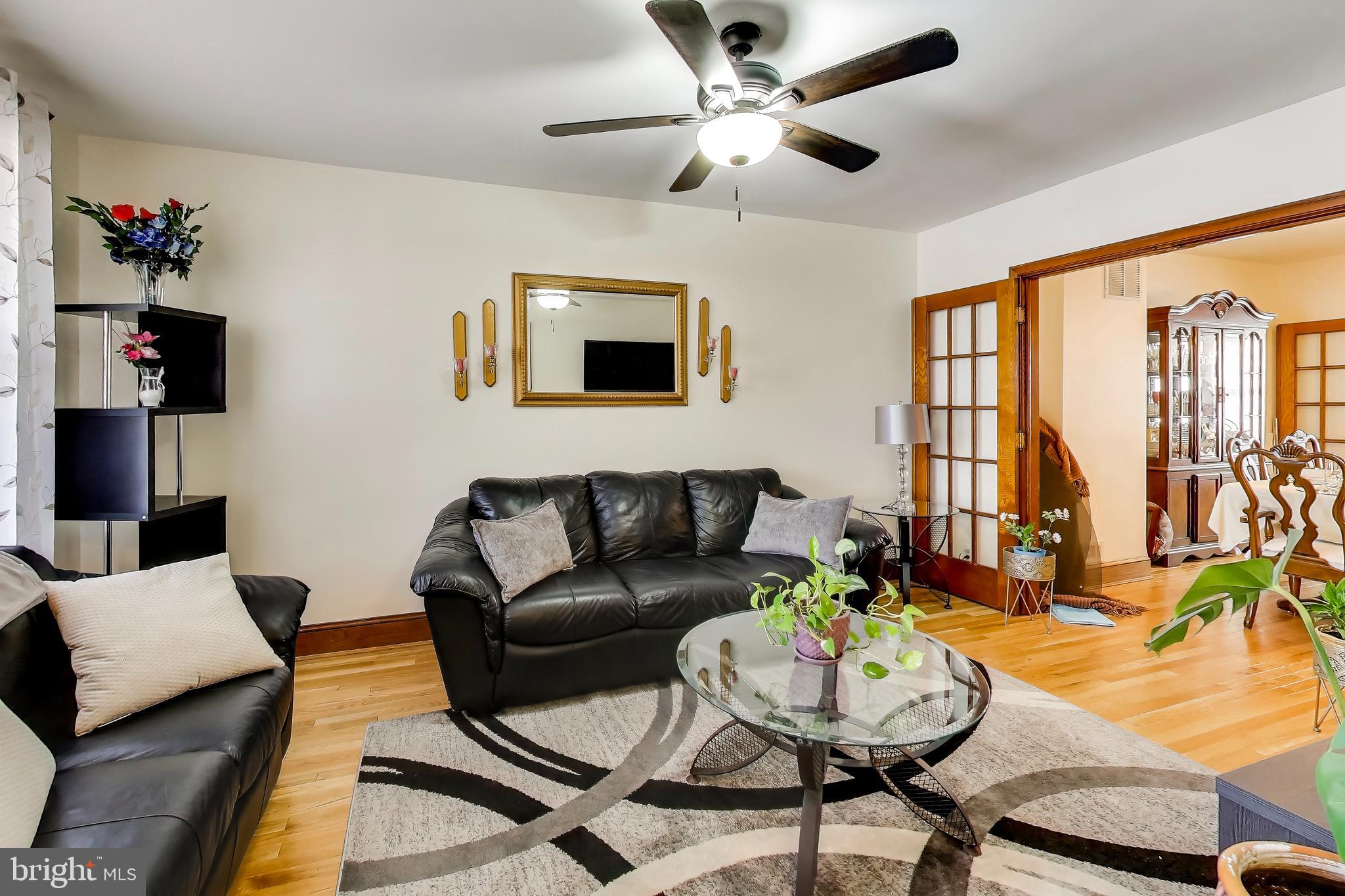 1655 C Street Northeast Washington, DC 20002 - Photo 3 of 18 a living room with furniture and a large window