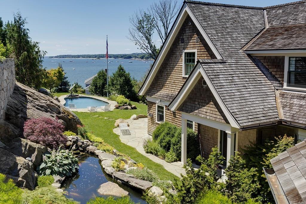 an aerial view of house with yard