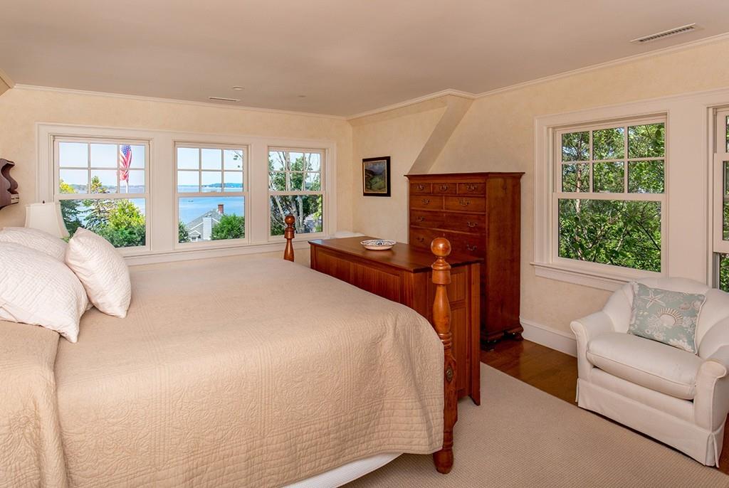 10 Smiths Point Road Manchester, MA 01944 - Photo 11 of 25 a bed room with a bed and a couch