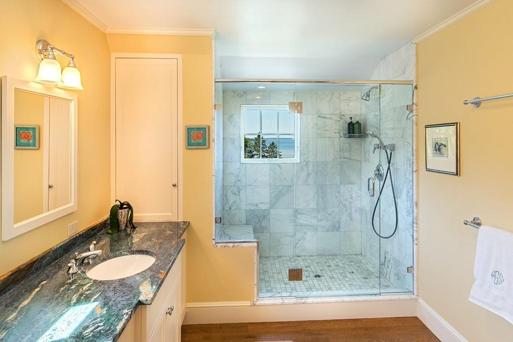 10 Smiths Point Road Manchester, MA 01944 - Photo 12 of 25 a bathroom with a granite countertop sink and a mirror