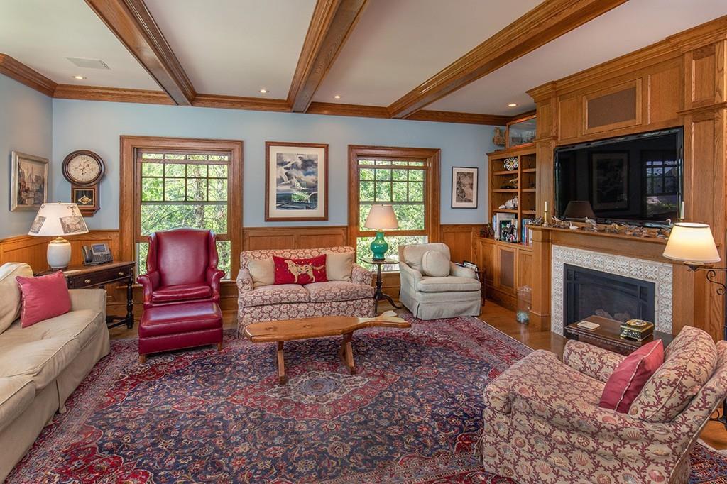 10 Smiths Point Road Manchester, MA 01944 - Photo 13 of 25 a living room with furniture a fireplace and a flat screen tv