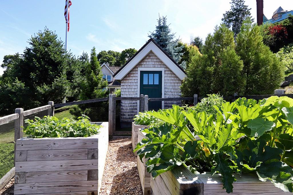 10 Smiths Point Road Manchester, MA 01944 - Photo 22 of 25 a view of a house with wooden fence