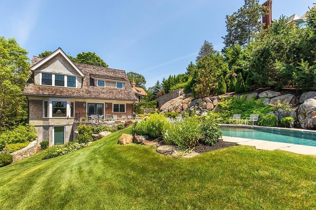 10 Smiths Point Road Manchester, MA 01944 - Photo 4 of 25 a front view of a house with a yard