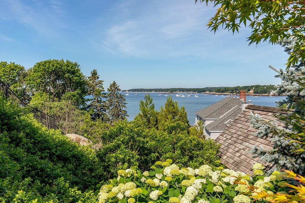10 Smiths Point Road Manchester, MA 01944 - Photo 10 of 25 an aerial view of a house with a yard and lake view
