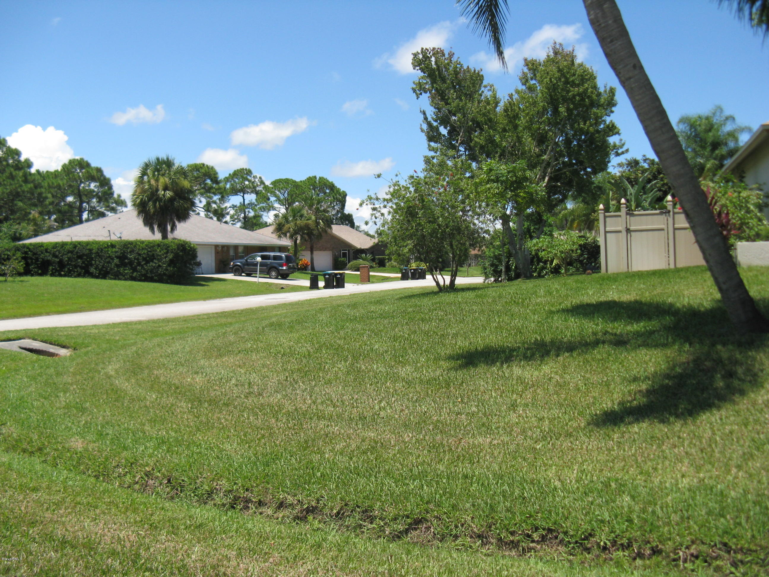 239 Rheine Road Northwest Palm Bay, FL 32907 - Photo 16 of 16 Side Yard