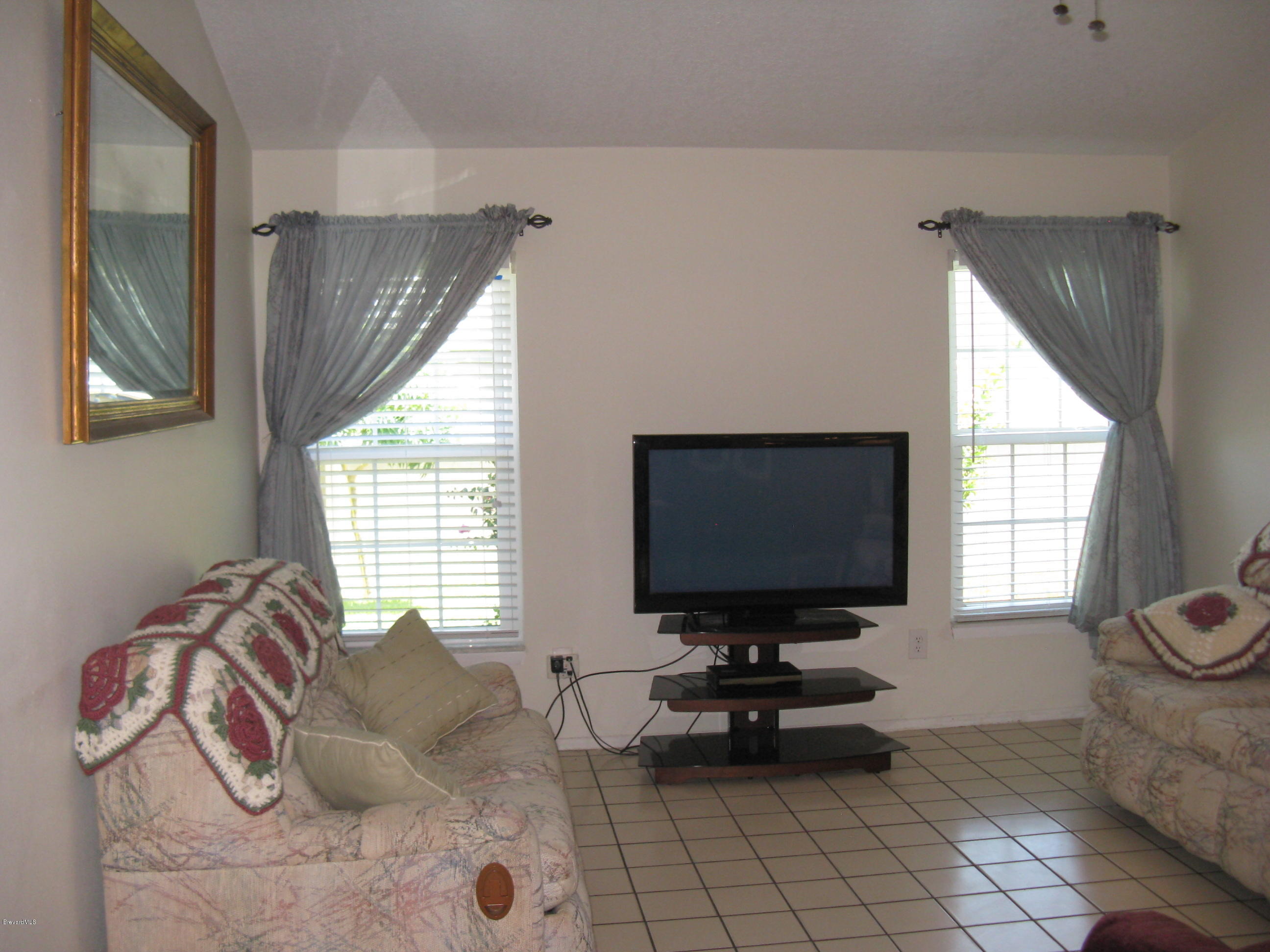 239 Rheine Road Northwest Palm Bay, FL 32907 - Photo 8 of 16 Family Room