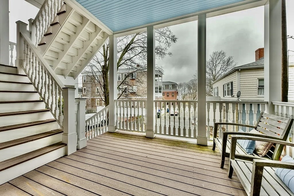 61 M Street, Unit 1 Boston, MA 02127 - Photo 11 of 15 a view of a balcony with wooden floor