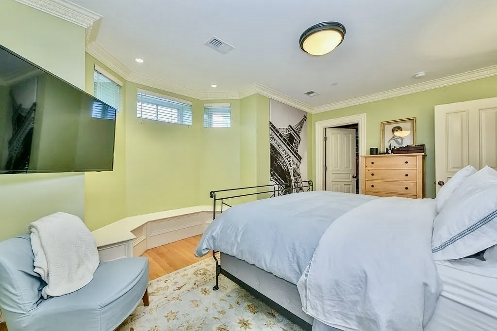 61 M Street, Unit 1 Boston, MA 02127 - Photo 13 of 15 a bedroom with a bed and a couch