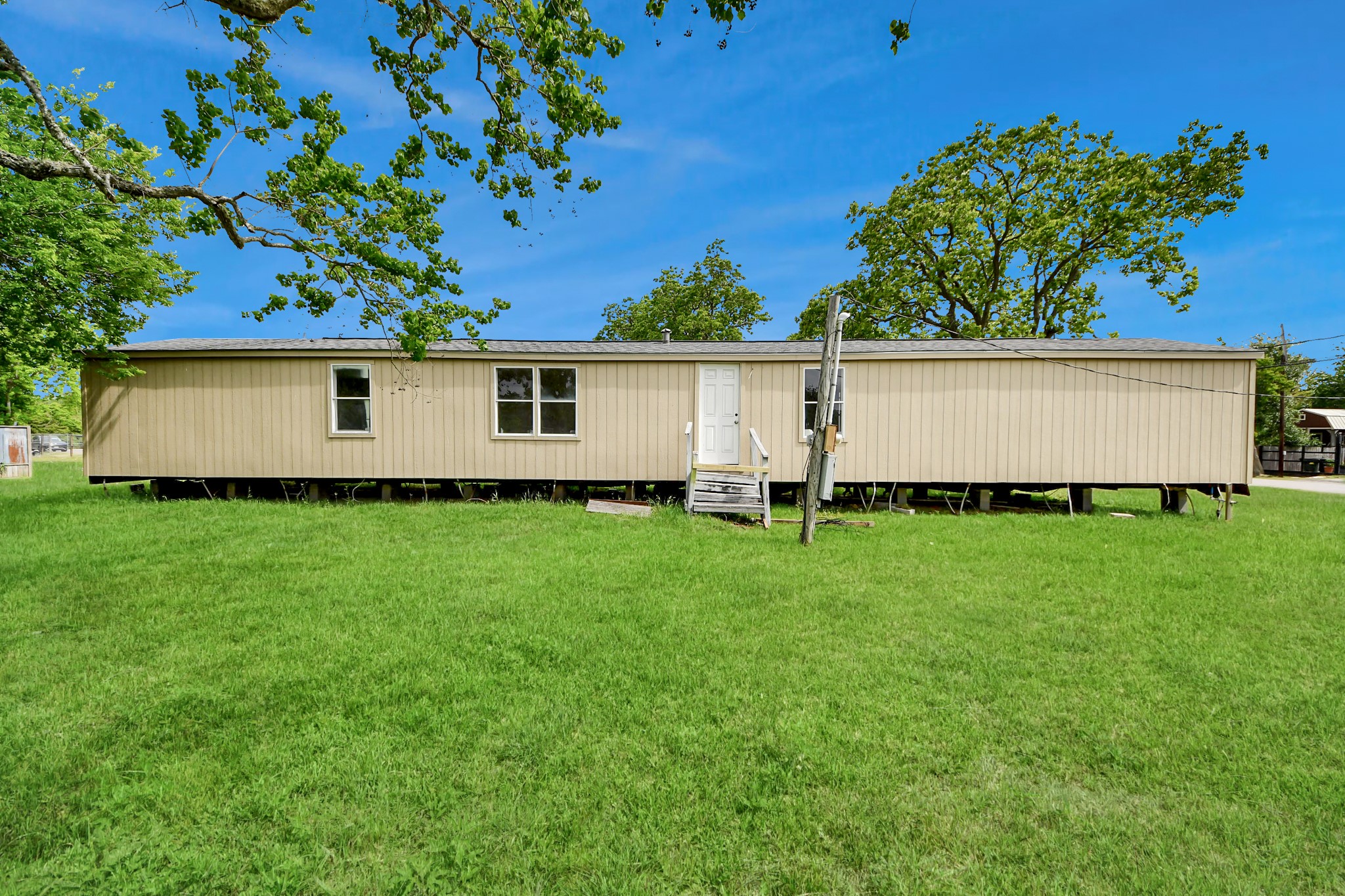 320 4th Street San Leon, TX 77539 - Photo 1 of 29 a view of backyard with garden