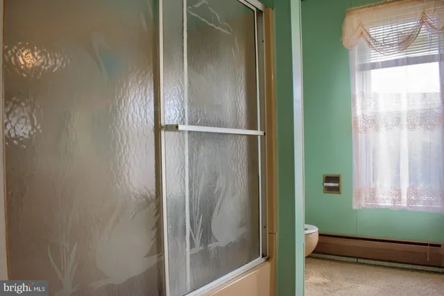 a room with cabinets and a window