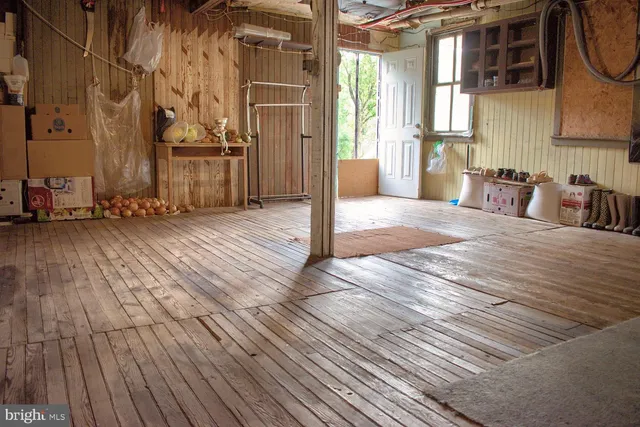 an empty room with shelves