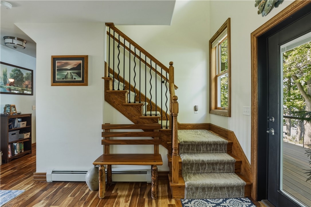 5580 Peach Orchard Road Hector, NY 14841 - Photo 20 of 50 Front entry with glass door to back deck