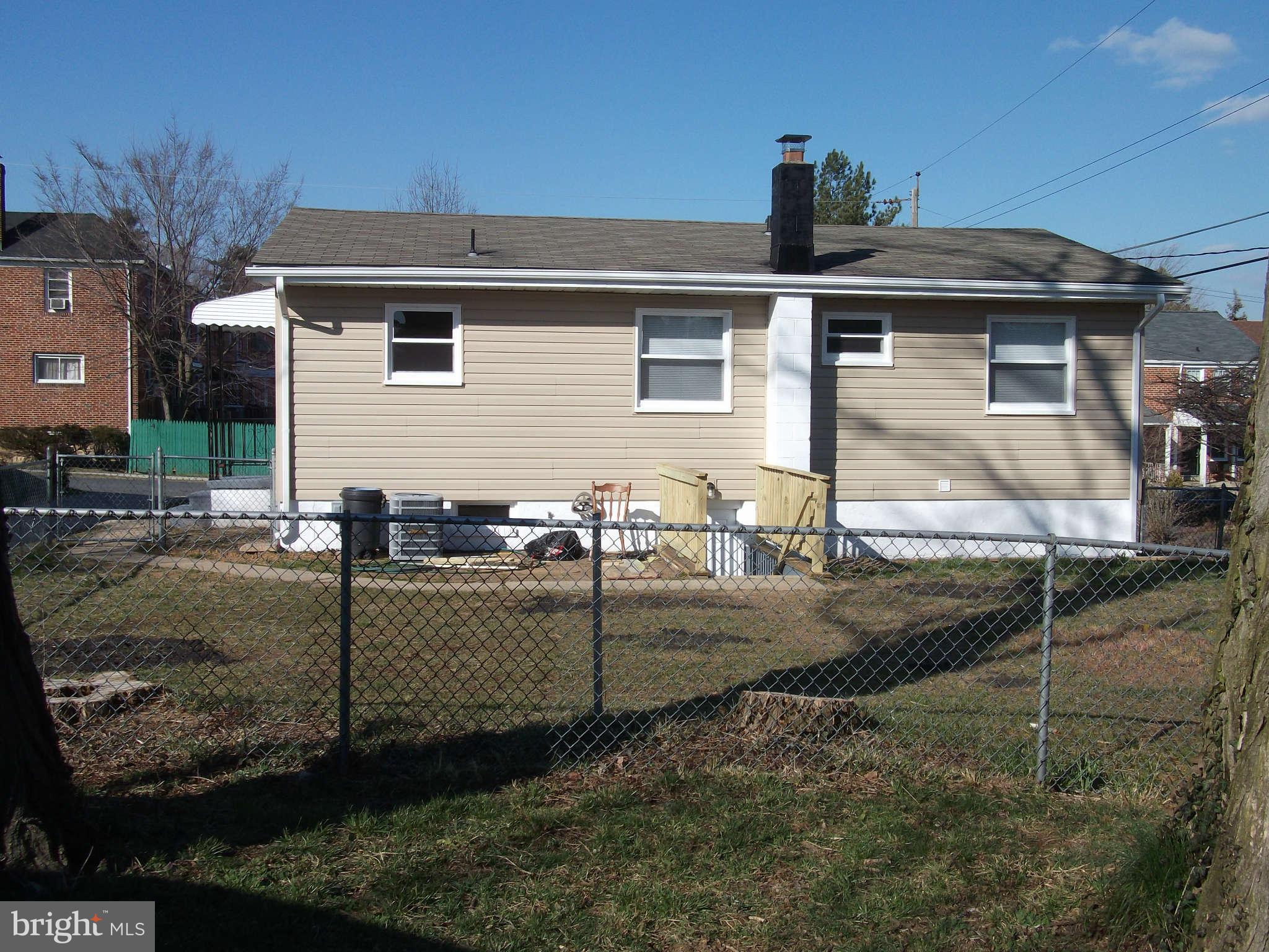 636 Braeside Road Baltimore, MD 21229 - Photo 3 of 30 a view of a house with backyard